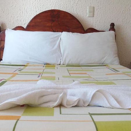Hotel Bigu ปูแอร์โตเอสกอนดิโด ภายนอก รูปภาพ