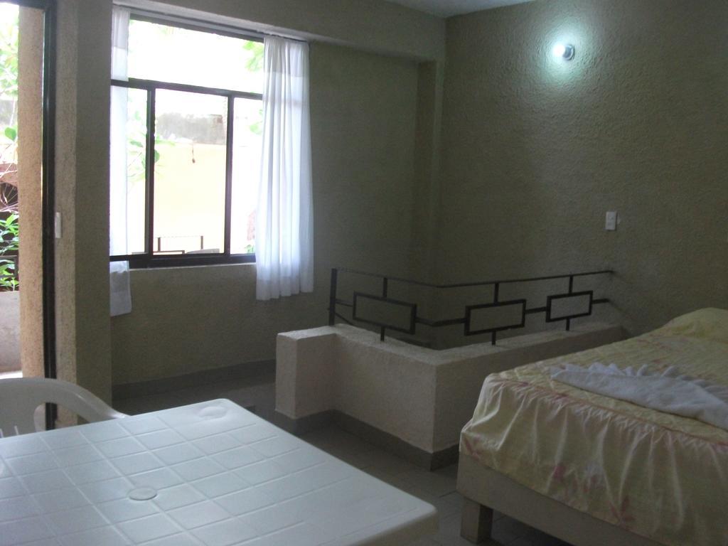 Hotel Bigu ปูแอร์โตเอสกอนดิโด ห้อง รูปภาพ