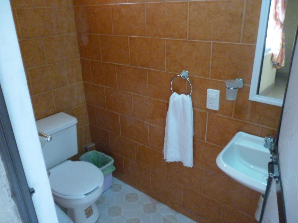 Hotel Bigu ปูแอร์โตเอสกอนดิโด ห้อง รูปภาพ