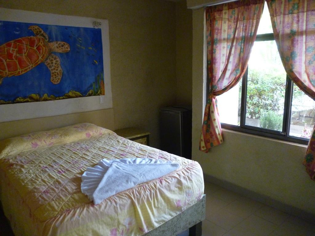 Hotel Bigu ปูแอร์โตเอสกอนดิโด ห้อง รูปภาพ