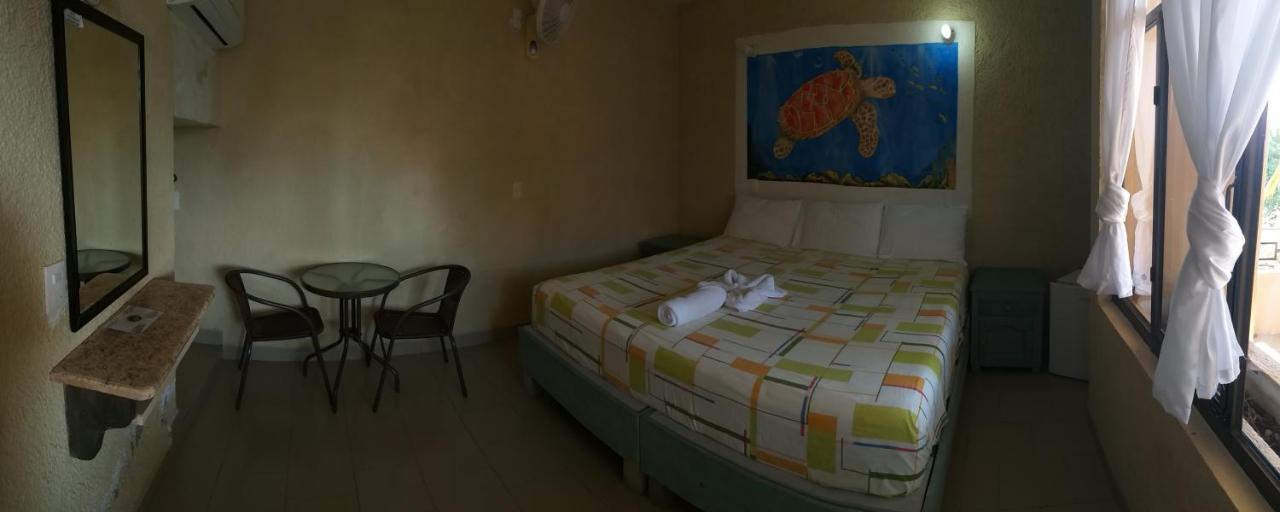 Hotel Bigu ปูแอร์โตเอสกอนดิโด ภายนอก รูปภาพ