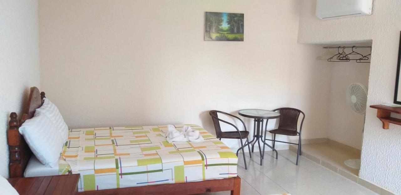Hotel Bigu ปูแอร์โตเอสกอนดิโด ห้อง รูปภาพ